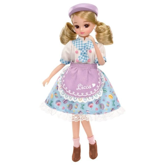  Licca doll in a baker's outfit with a lavender beret, apron, and dessert-themed skirt.