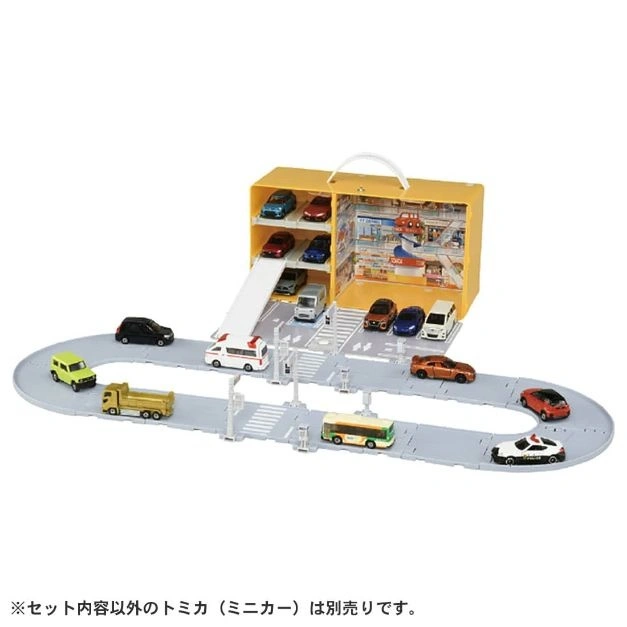  Toy car playset with case, track, and miniature vehicles in various colors and styles.