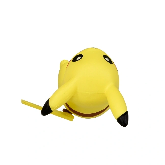  Yellow Pikachu toy with black eyes and ear tips, lying on its stomach.