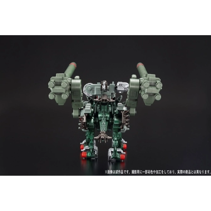  Green Zoid toy with large cannons on its back, standing on a black surface.