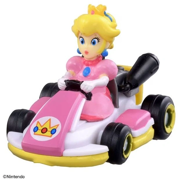  Princess Peach in a pink and white Mario Kart. Toy figurine.