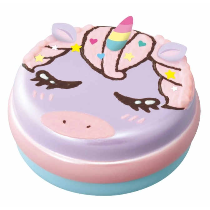 Unicorn-themed toy cake with pastel layers and a cute, sleepy unicorn face design.