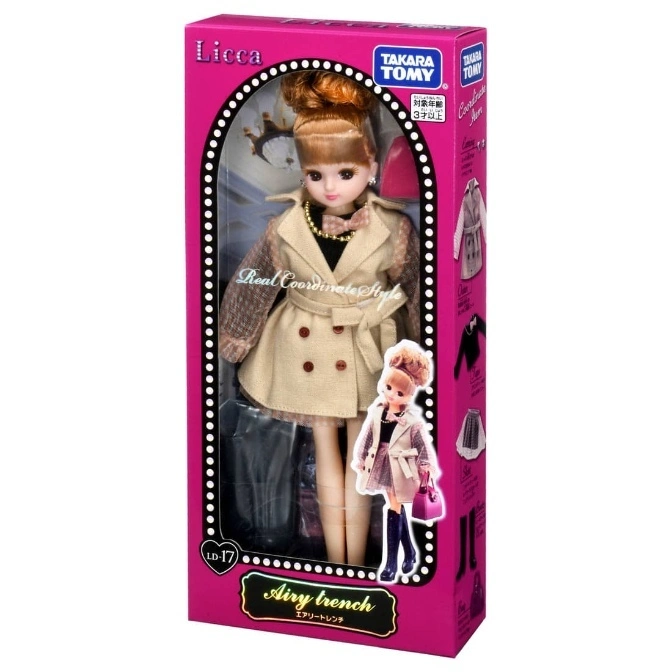  Licca doll in a pink box wearing a trench coat with a dress and boots. "Airy trench" is printed on the box.