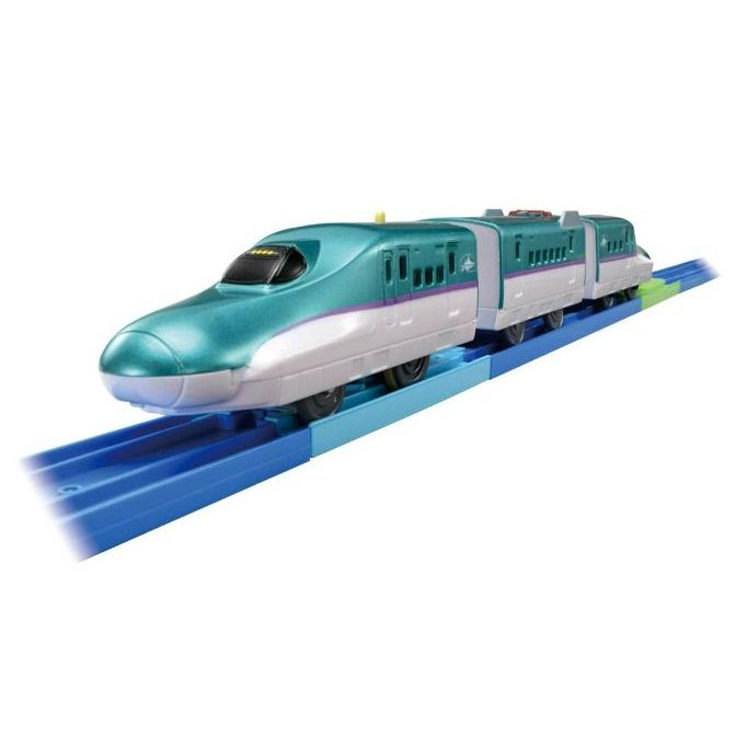 A toy train on a blue track.