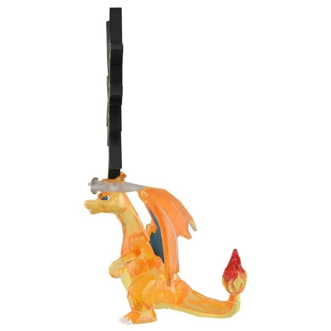  Charizard geometric figurine with flame tail and black stand.