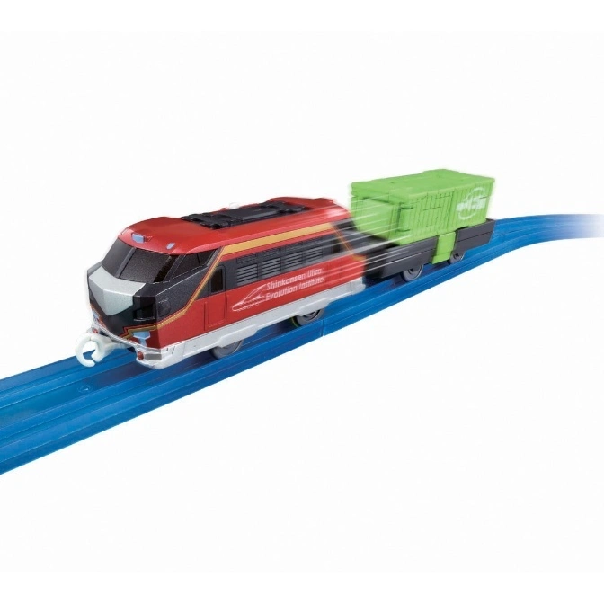 Red toy train with green cargo car on blue tracks, suggesting motion.