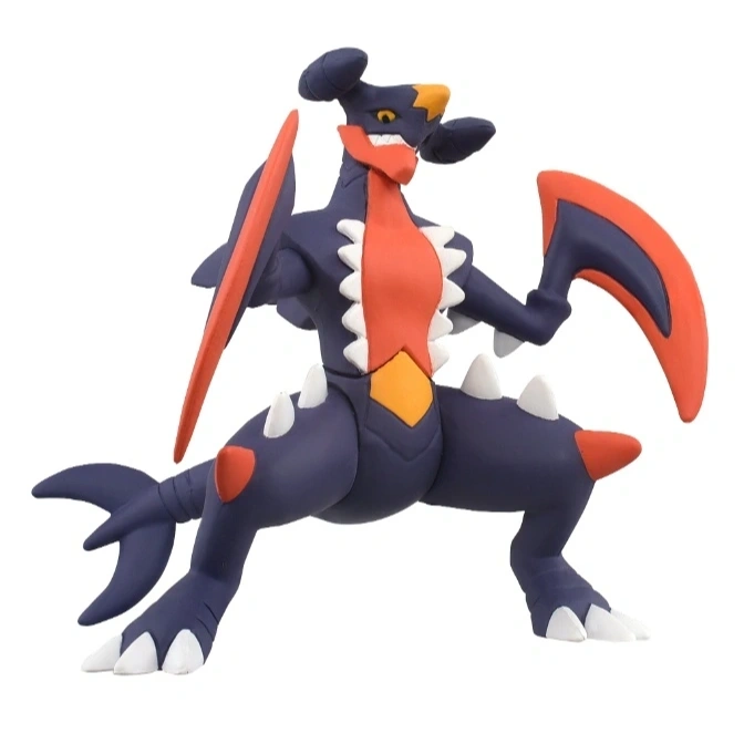  Garchomp toy figure in a dynamic pose, featuring its signature blue, red, and yellow colors.