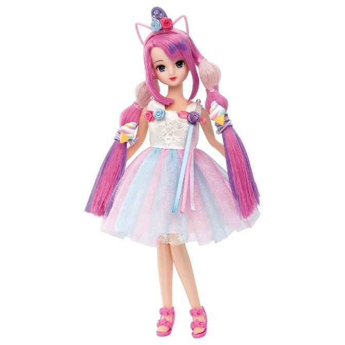  Unicorn doll with pink hair, pastel dress, and candy accents.