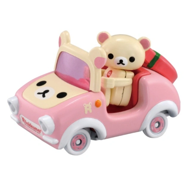 Rilakkuma bear driving a pink convertible toy car with bear-ear details.