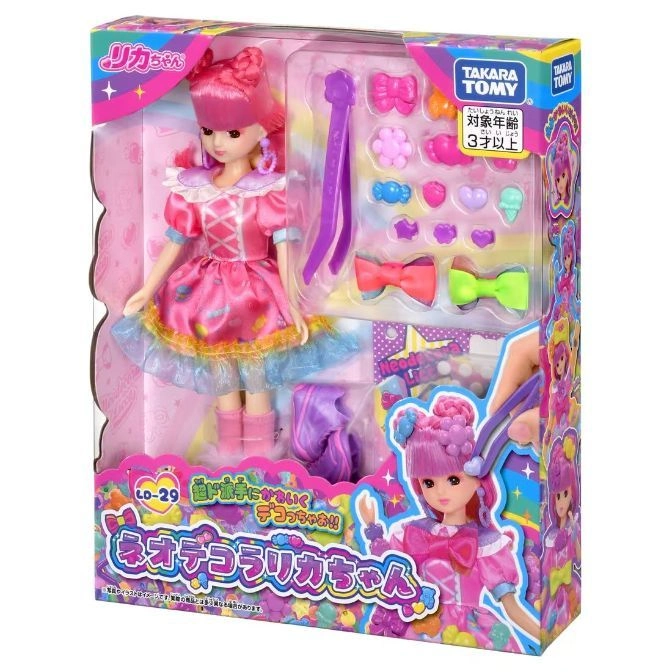  Licca-chan doll with pink hair and dress, accessories included, in packaging. Suitable for ages 3+.