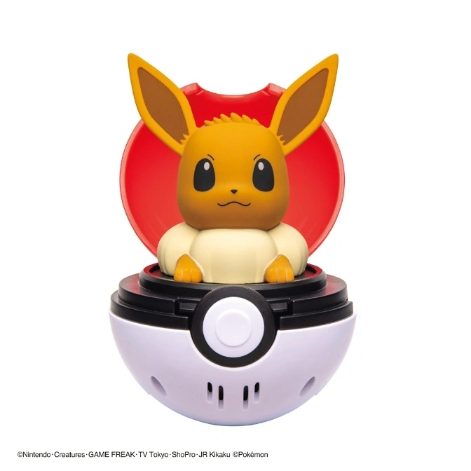 Eevee in a Poké Ball toy. The top of the ball is open, revealing Eevee inside.