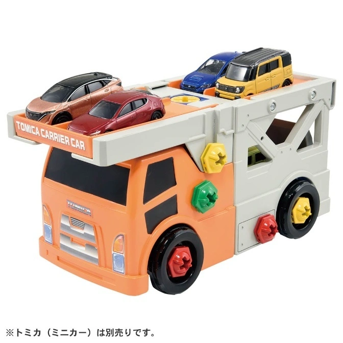  Tomica carrier truck toy with four toy cars on top. Colorful bolt details on sides.