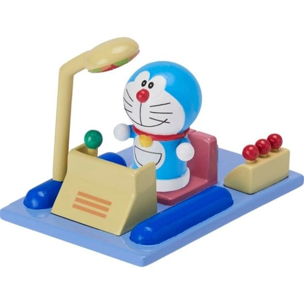 Doraemon toy set with a control panel, light, seat, and red ball details on a blue base.