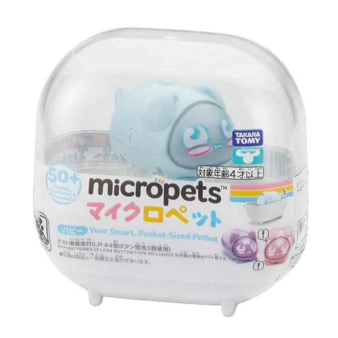  MicroPets toy in packaging: a small, interactive robot pet with sounds and movements.