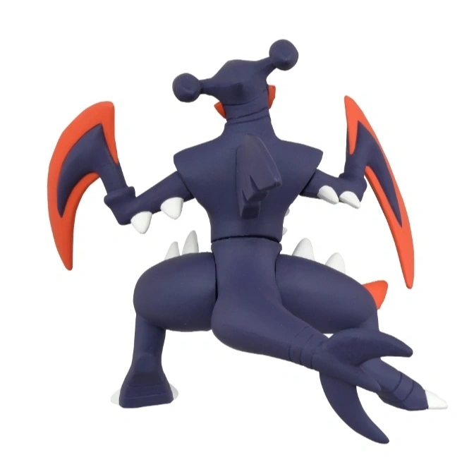  Garchomp toy figure with red blades, in a dynamic pose.