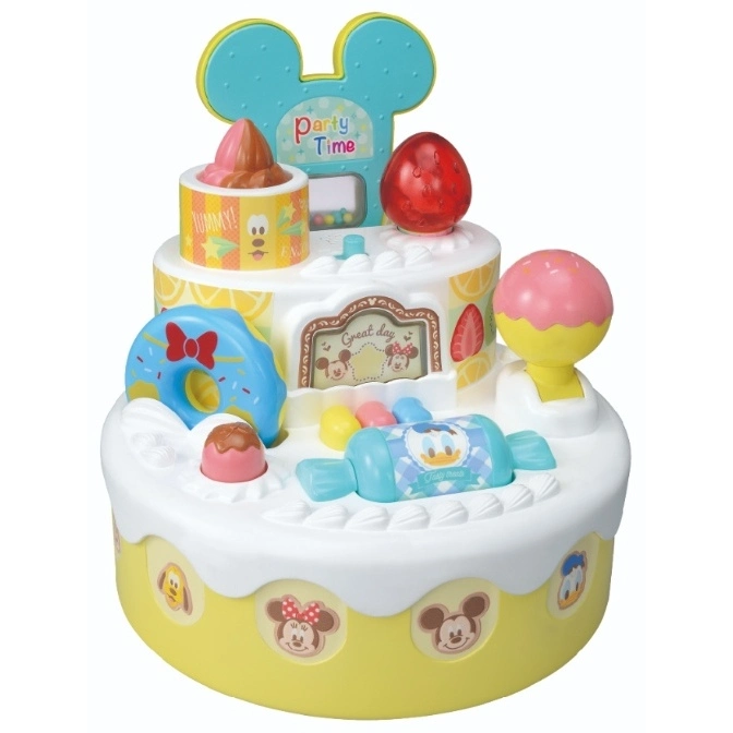 Disney-themed toy cake with Mickey Mouse ears, toppings, and character decorations.