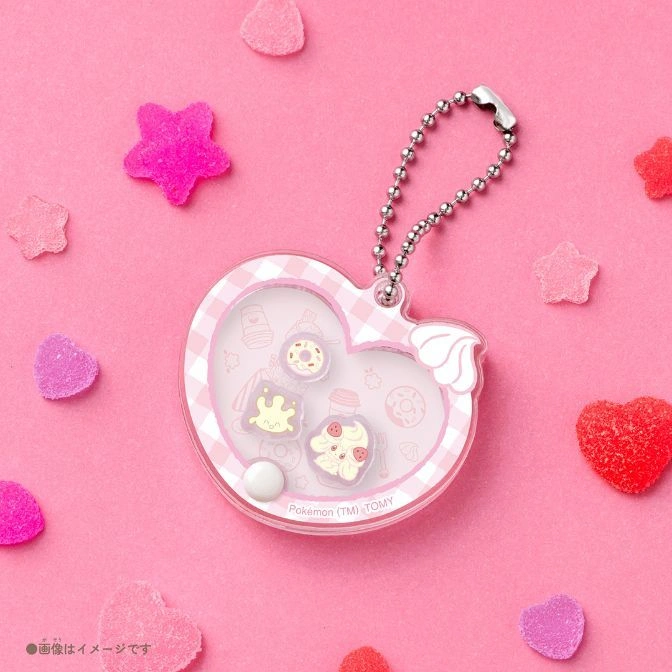  Heart-shaped Pokémon toy keychain with sweets inside, pink gingham border, and silver chain.