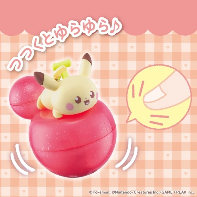  Wobbling Pikachu toy on a pink sphere. Press to make it wobble.