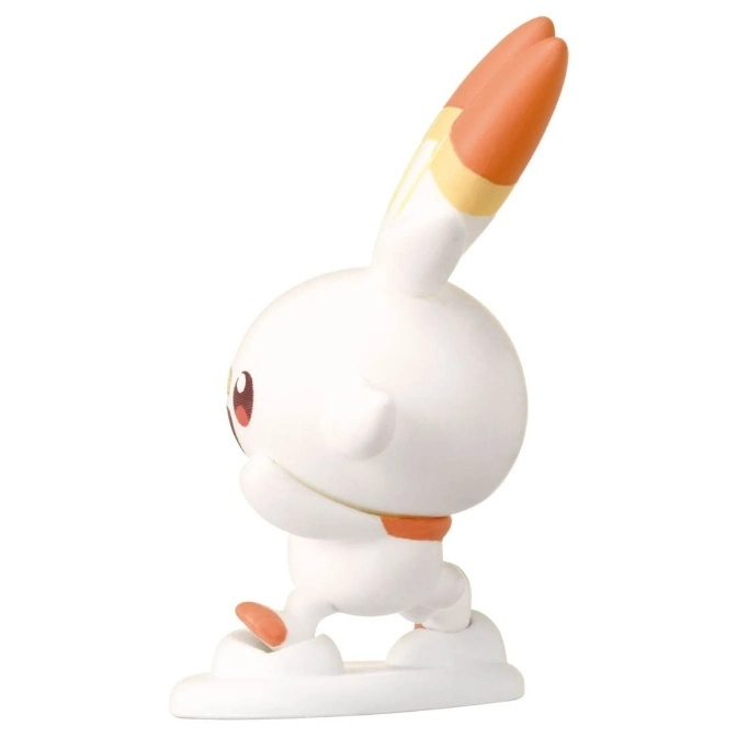  Scorbunny figurine in running pose, white body with orange accents.