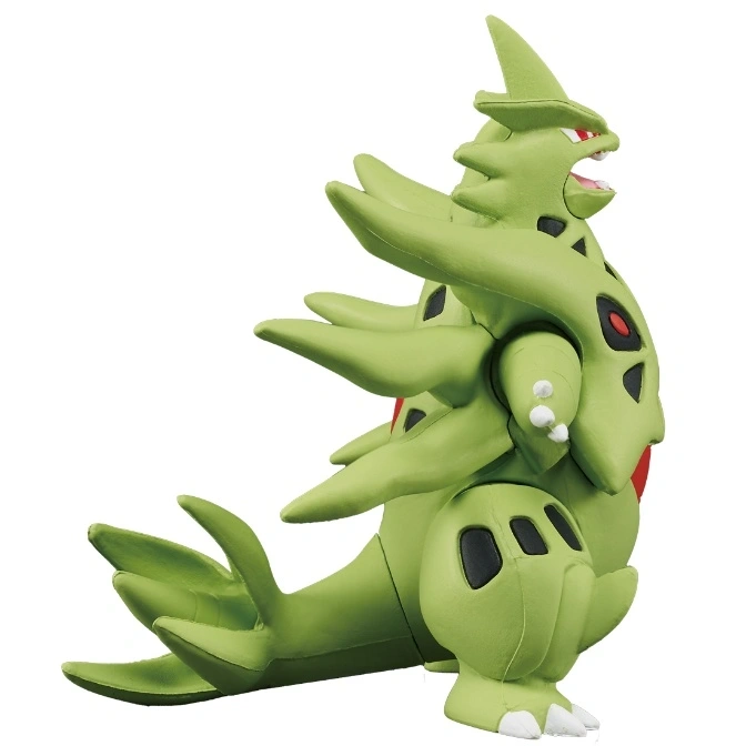  Green Tyranitar toy figure with spikes and red eyes.