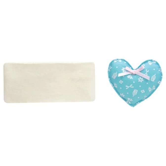  Rectangular bar of soap next to a blue heart-shaped plush toy with a pink bow.