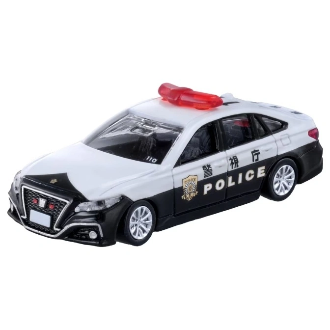 Toy Japanese police car with red light bar, black and white paint.