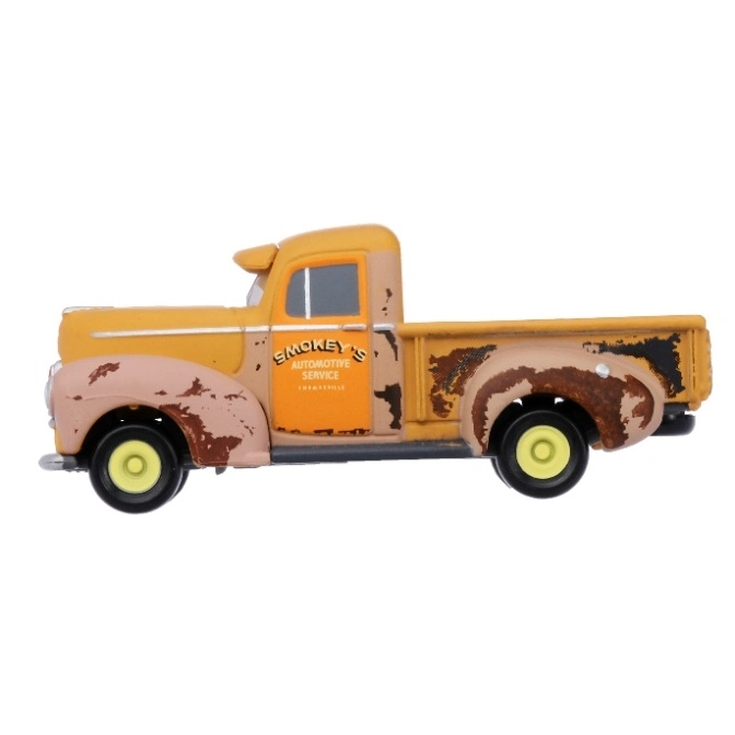  Smokey's Automotive Service toy truck with a weathered paint job and yellow wheels.