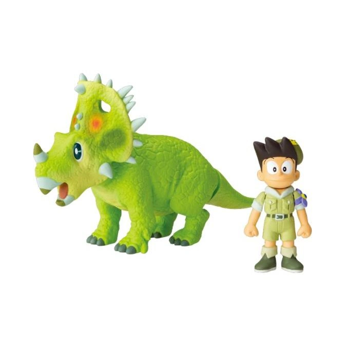 Green Triceratops toy with a boy figurine in khaki safari outfit and cap.