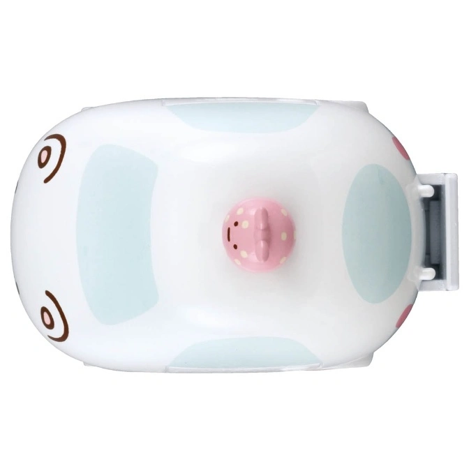  White toy dispenser with light blue spots and a pink pig nose button.
