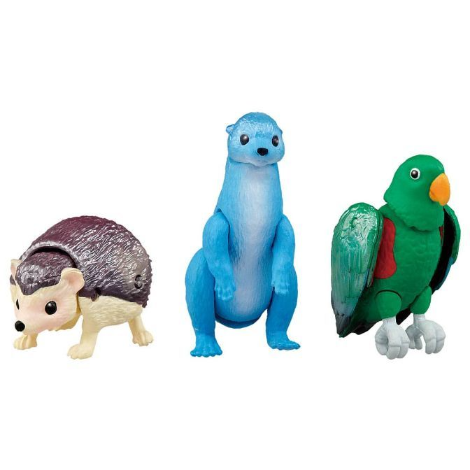 Three animal toys: a hedgehog, a blue otter, and a green parrot with an orange beak.