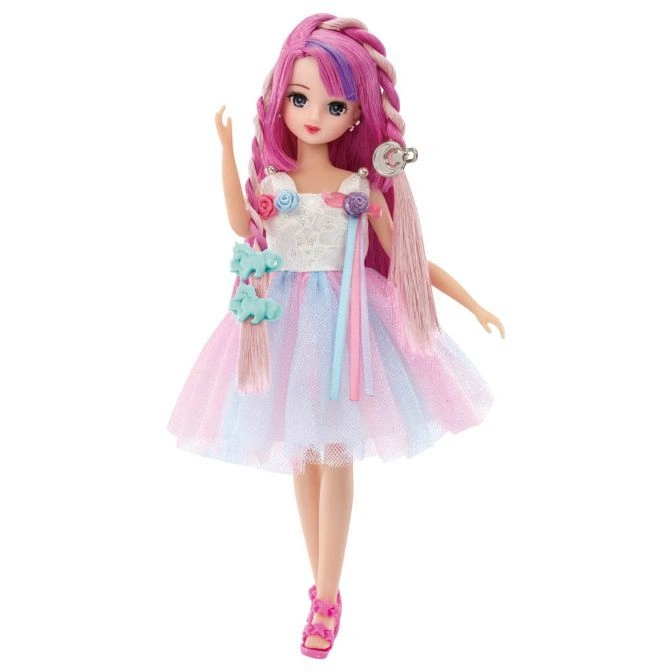  Doll with pink hair, pastel dress, and pink shoes.