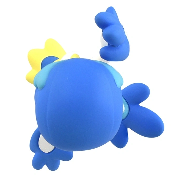  Blue toy with yellow star and raised hand.