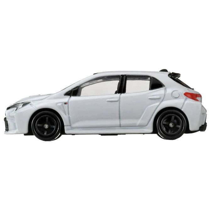  White Toyota GR Corolla toy car with black wheels, side view.