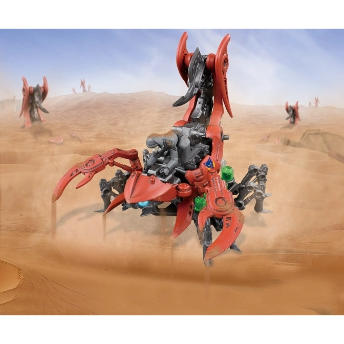  Red scorpion toy with claws and a rider in a desert setting.
