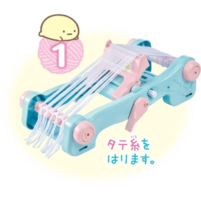  Toy loom with white yarn, light blue frame, and pink accents. Cartoon character and number one graphic.