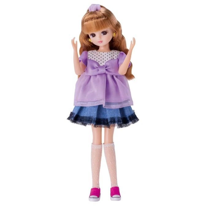  Doll with brown hair, purple dress, denim skirt, knee socks, and pink sneakers.