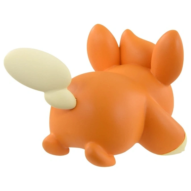  Orange toy creature with cream tail and ears, viewed from the rear.