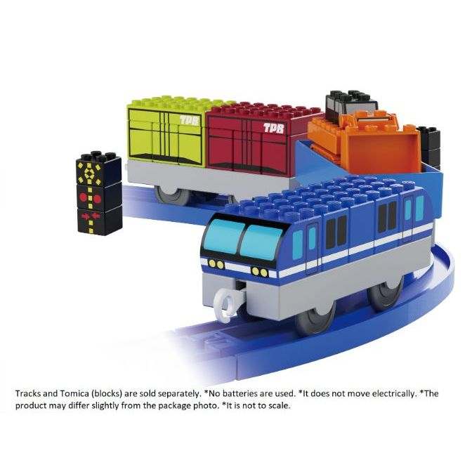 Toy train set with blue engine and colorful block cars on a blue track.
