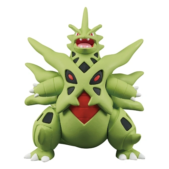 Green Tyranitar toy with red and black accents, standing.