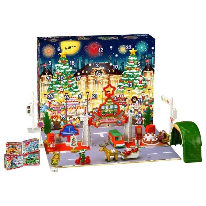  Christmas advent calendar toy set with town scene, figures, vehicles, and numbered doors.