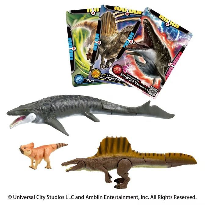 Dinosaur toys: Spinosaurus, Mosasaurus, Pachycephalosaurus, and trading cards.