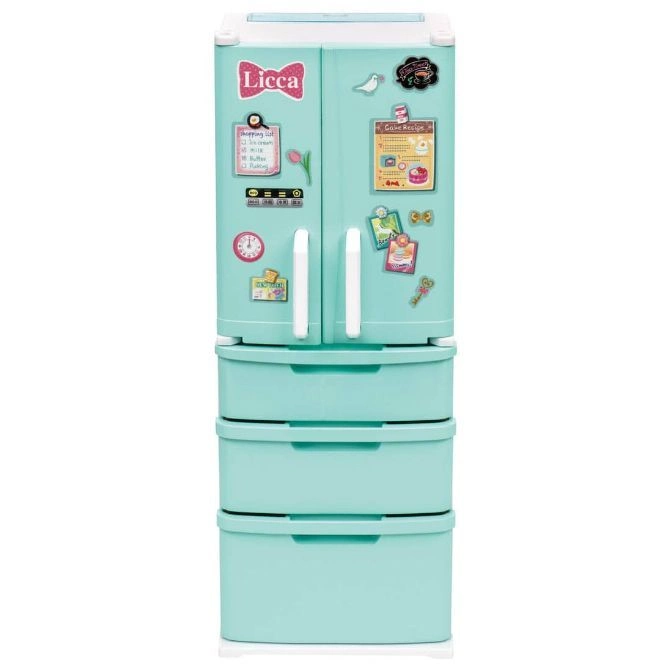 Mint green Licca doll refrigerator with drawers and decorative magnets.