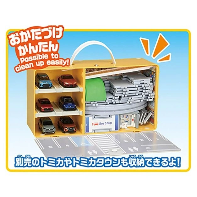  Toy car carrier with cars, tracks, and bus stop. Opens into a playmat with parking spaces.