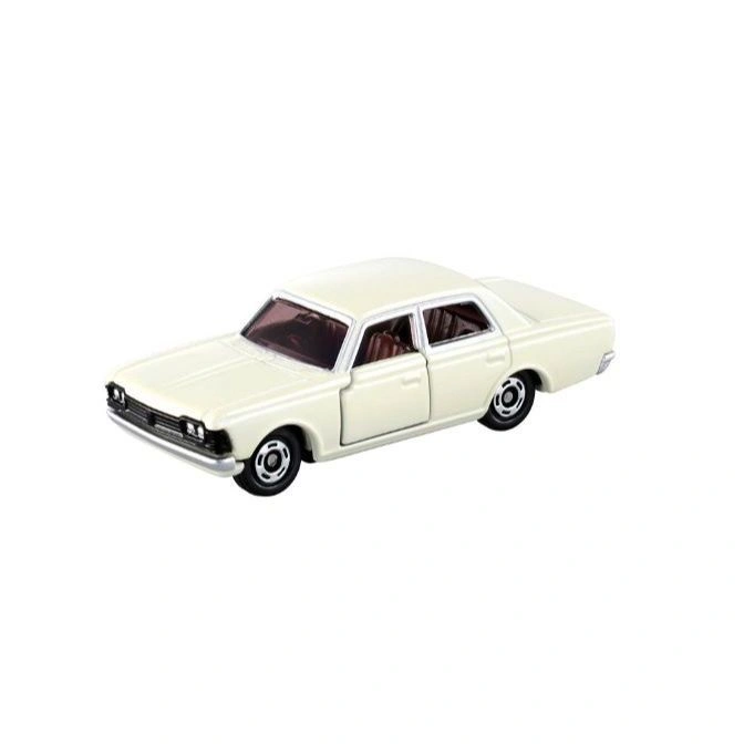 Cream-colored toy sedan with black wheels and chrome accents.