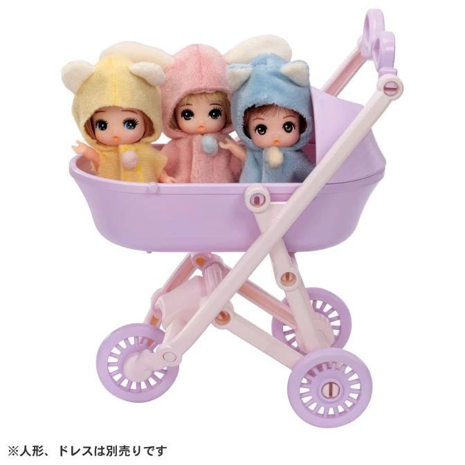 Toy pram with three baby dolls wearing hooded outfits in yellow, pink, and blue.