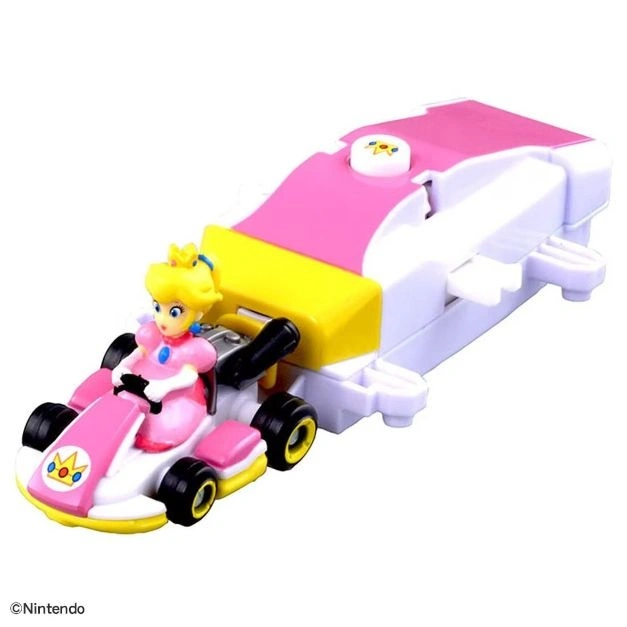  Princess Peach in her pink and white Mario Kart toy car with yellow accents.