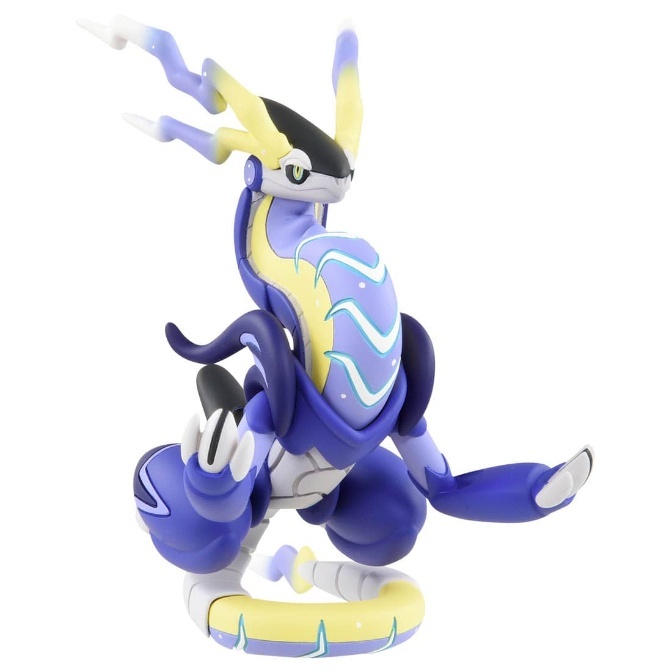 Miraidon toy figure, purple and yellow dragon-like Pokémon, coiled pose.