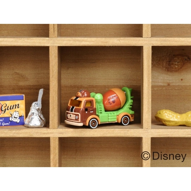  Toy cement truck with acorn mixer in a wooden shelf display.