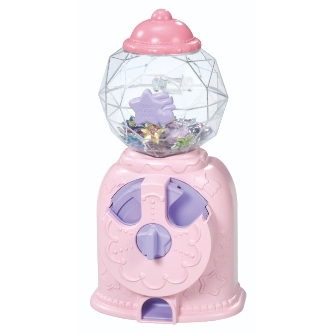 Pink gumball machine toy with clear dome filled with star-shaped trinkets.