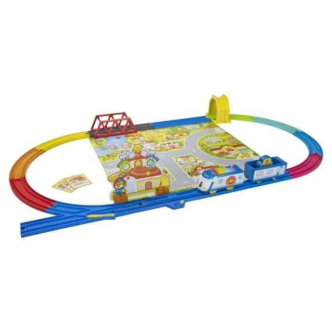 Toy train set with colorful tracks, bridge, tunnel, town map, and a cartoon train.